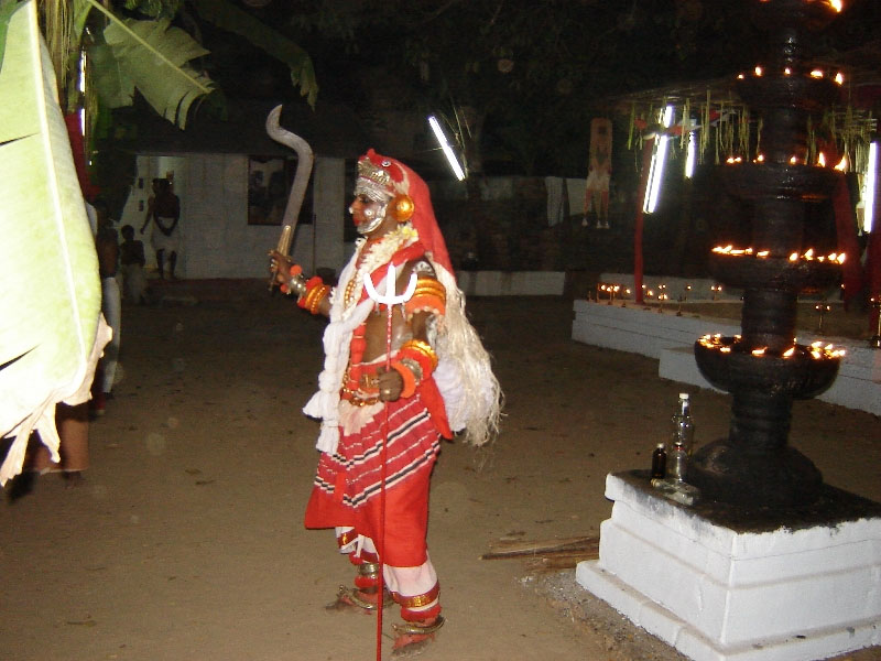 A Theyyam ritual performance at a local North Kerala temple
